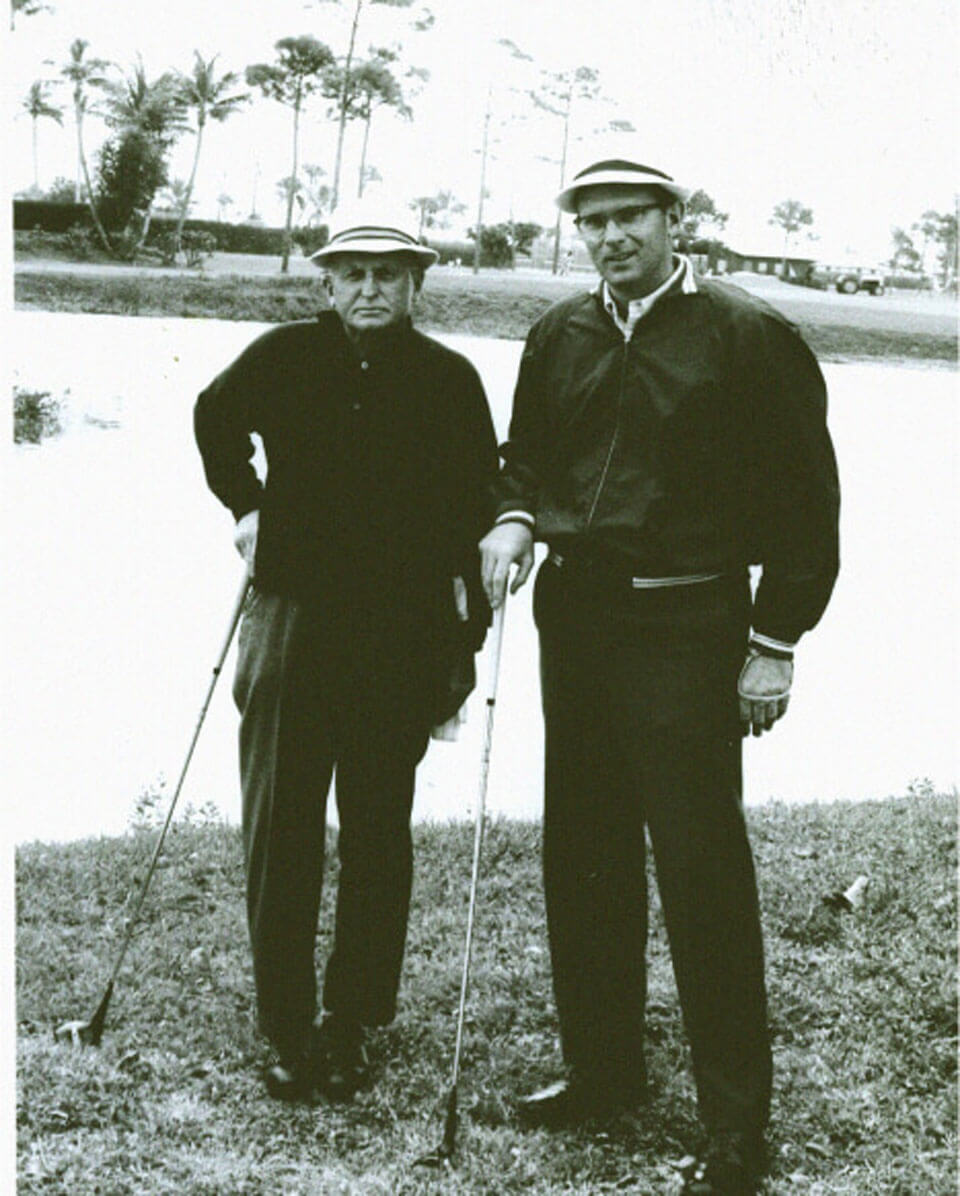 Charles Luck Jr. golfing in Fort Lauderdale, FL with his son